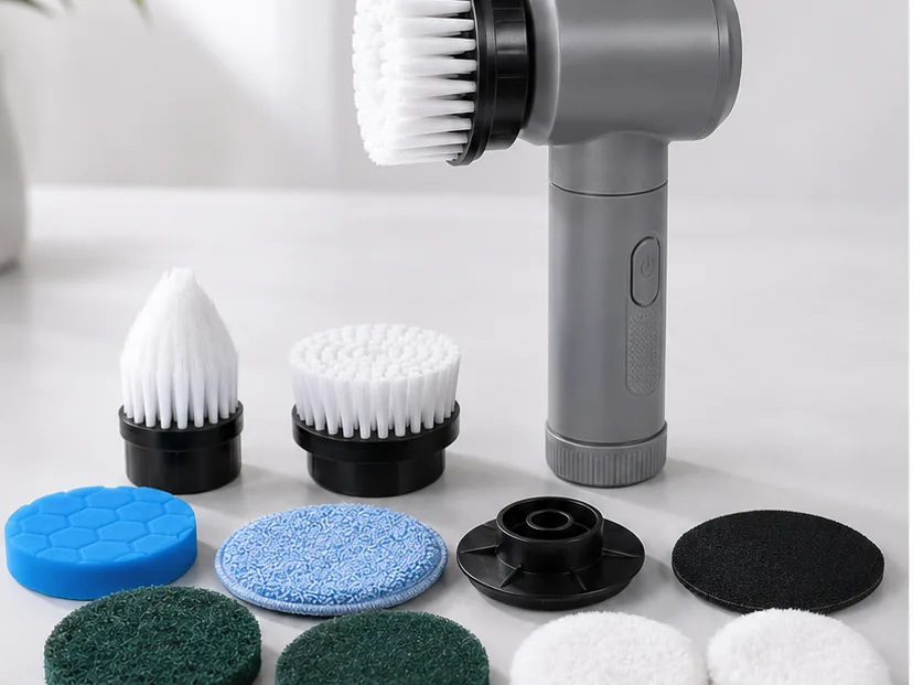 ORVENA Detail handheld scrubber beside its five replaceable cleaning heads