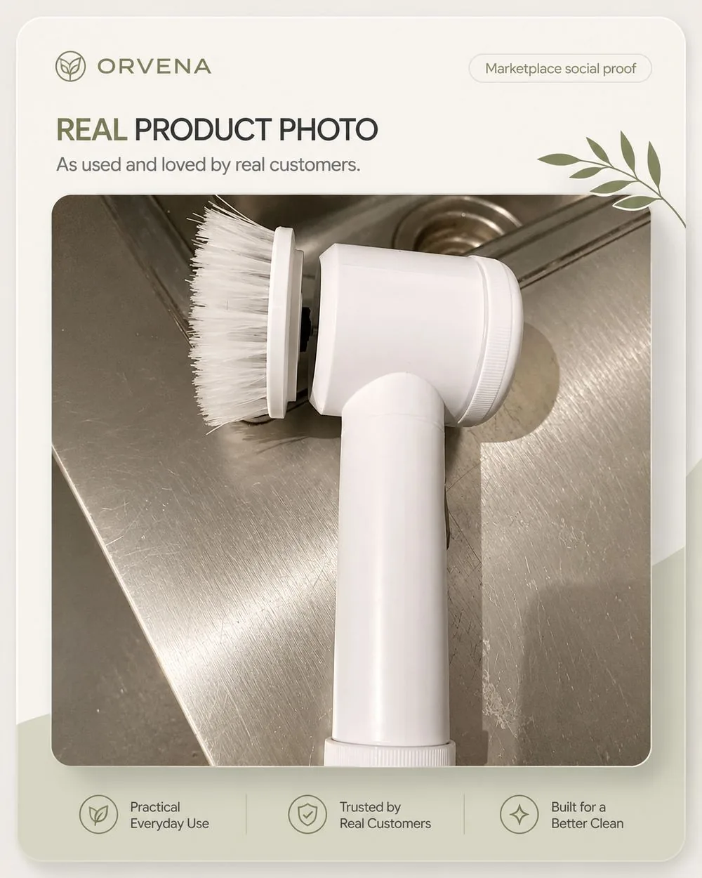 Marketplace buyer photo of a white electric spin scrubber with a bristle head resting on a sink